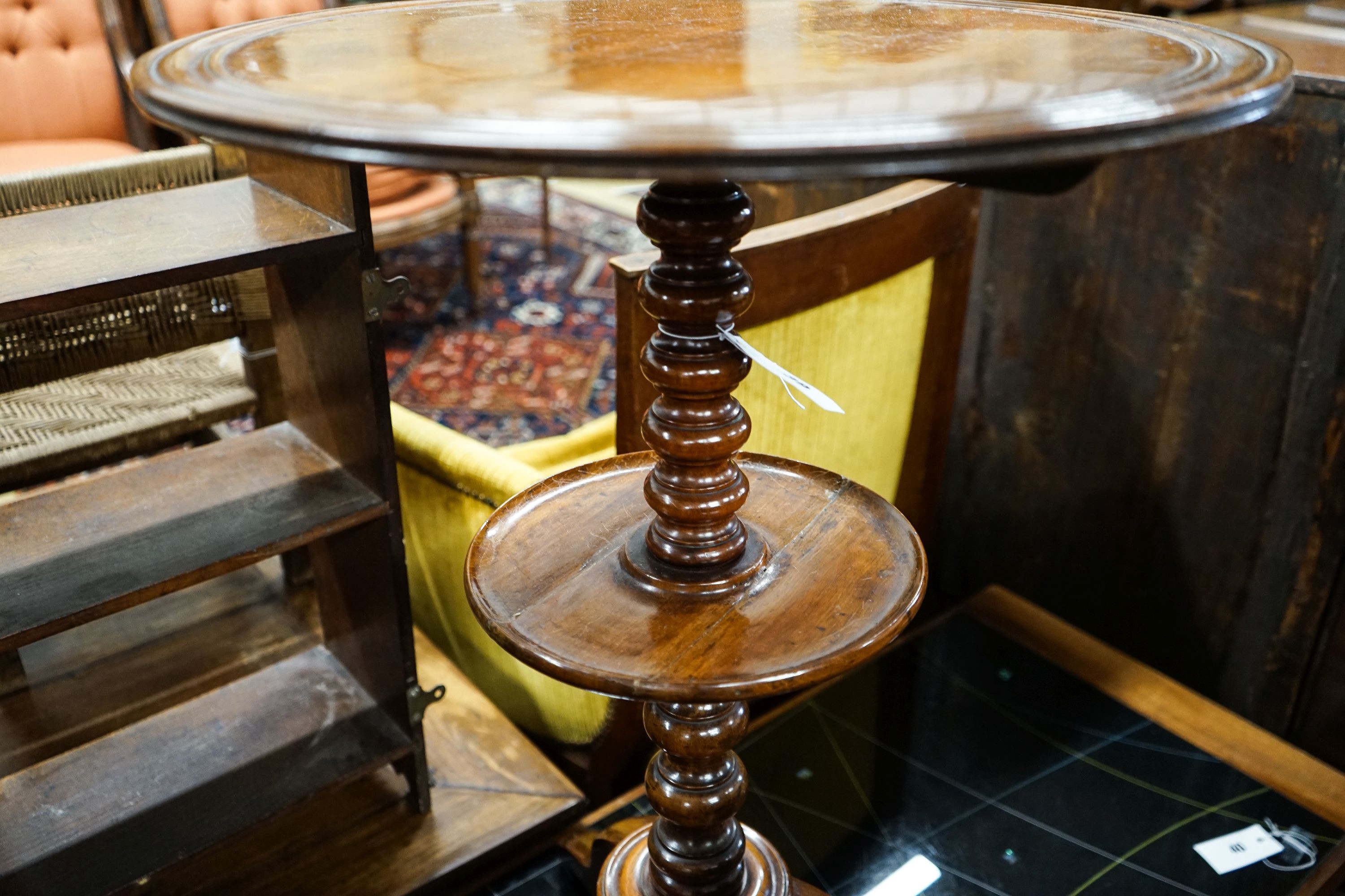 A French two tier mahogany Gueridon tripod table, diameter 48cm, height 72cm
